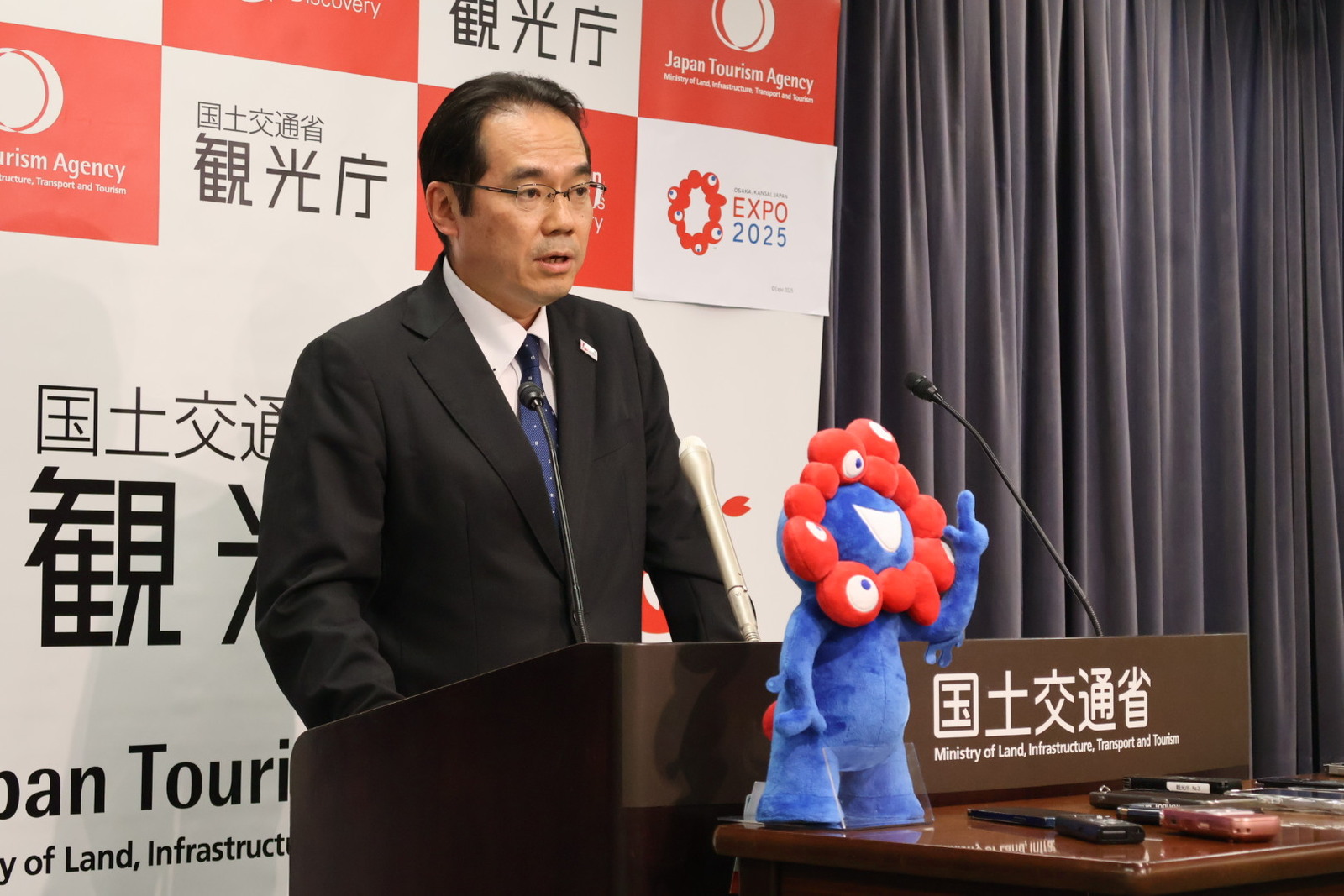 ▲観光庁の村田茂樹長官 定例会見：訪日ラボ撮影