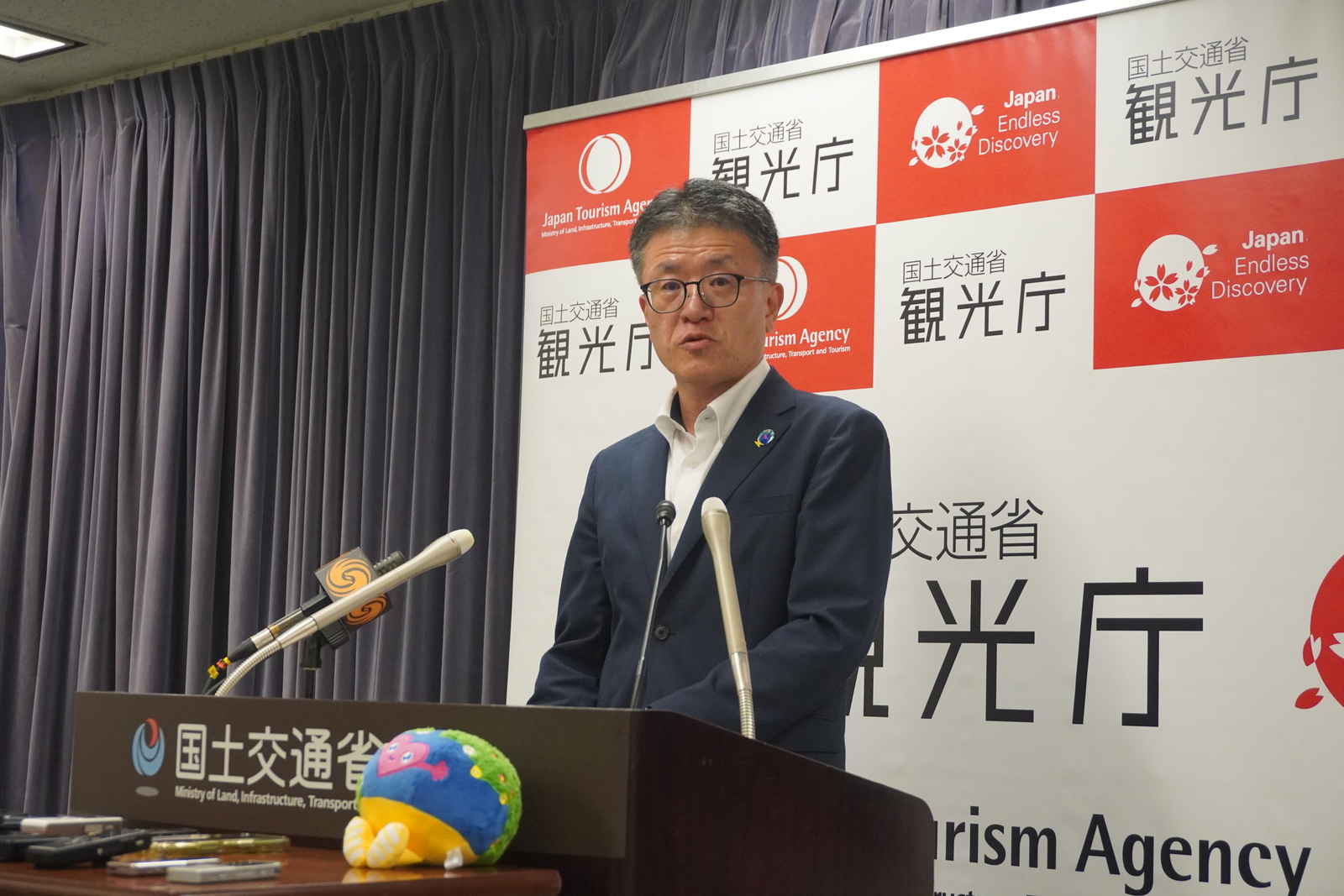 ▲観光庁の木村典央長官 定例会見：訪日ラボ撮影